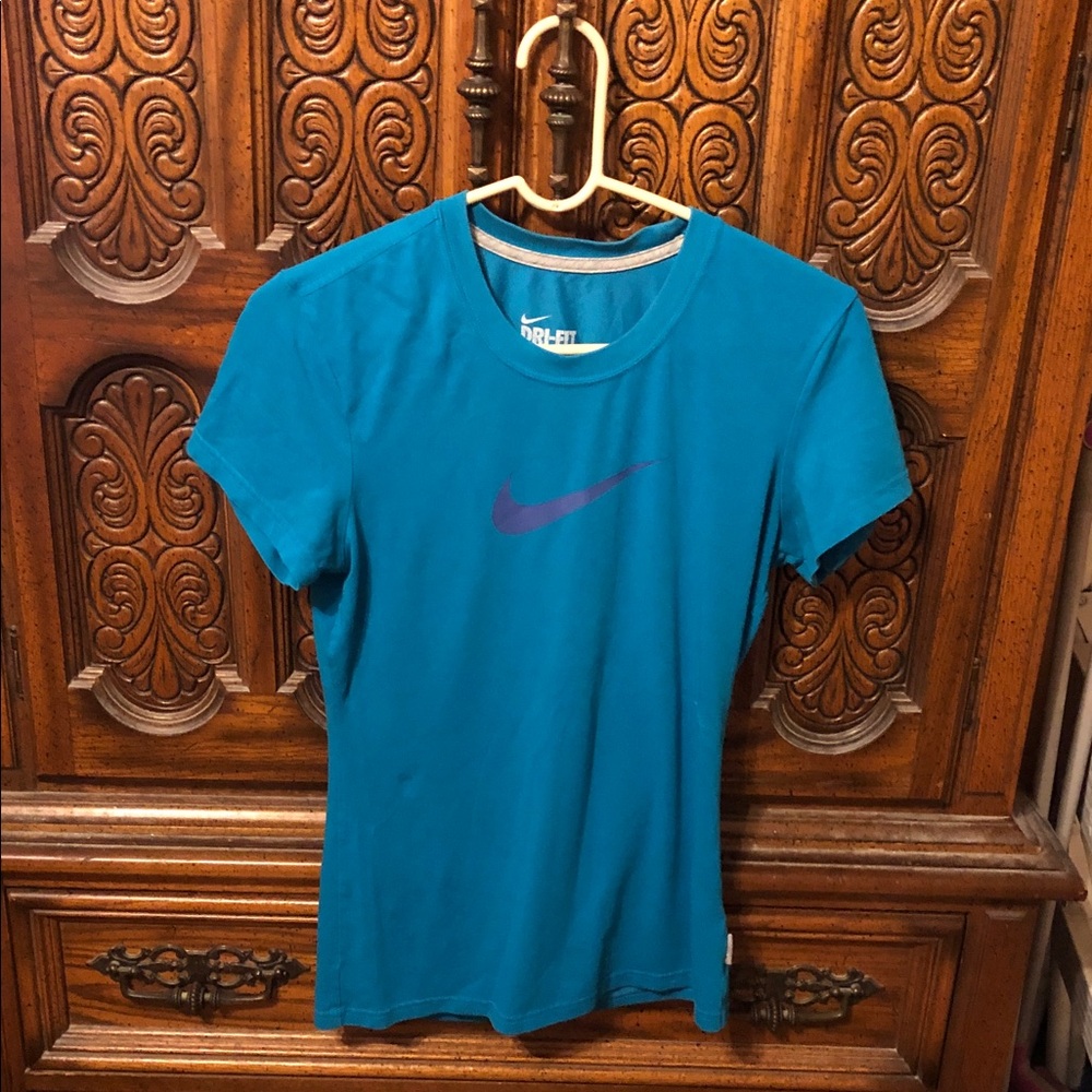 Nike Women's Teal Short-Sleeve Athletic Tee with Purple Swoosh